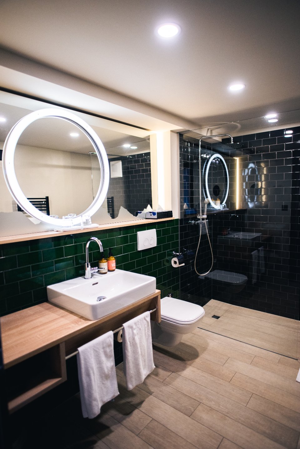A modern bathroom with a wall-hung toilet